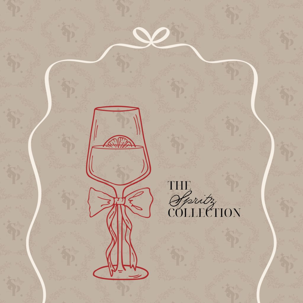 illustrated cocktail glass in red on tan background with brown serif and script font